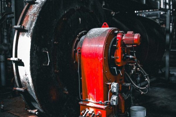 Photo by Hans Eiskonen Industrial machinery with red metal components